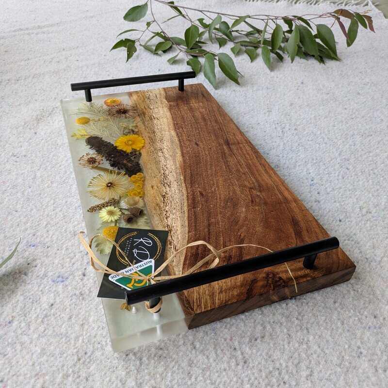This charcuterie board will be great On mums’ special day, go beyond the ordinary and gift your mum something extraordinary with this handcrafted Flora, timber and resin grazing board that embodies love, artistry, and the timeless beauty of Australia. Let every meal shared on this board be a celebration of the bond you share, the memories you create, and the love that binds you together.