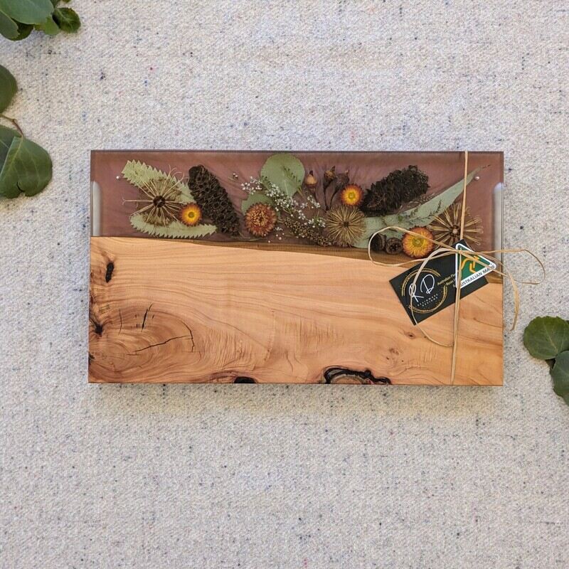 This charcuterie board will be great On mums’ special day, go beyond the ordinary and gift your mum something extraordinary with this handcrafted Flora, timber and resin grazing board that embodies love, artistry, and the timeless beauty of Australia. Let every meal shared on this board be a celebration of the bond you share, the memories you create, and the love that binds you together.