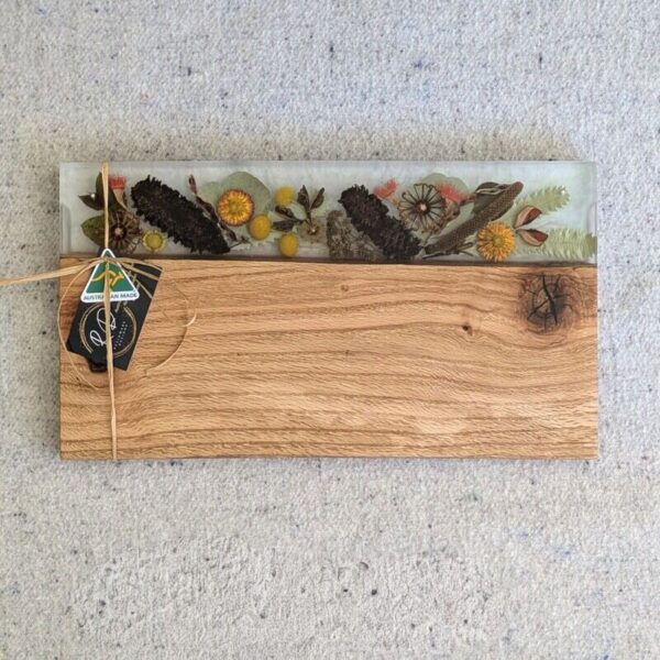 This charcuterie board will be great On mums’ special day, go beyond the ordinary and gift your mum something extraordinary with this handcrafted Flora, timber and resin grazing board that embodies love, artistry, and the timeless beauty of Australia. Let every meal shared on this board be a celebration of the bond you share, the memories you create, and the love that binds you together.