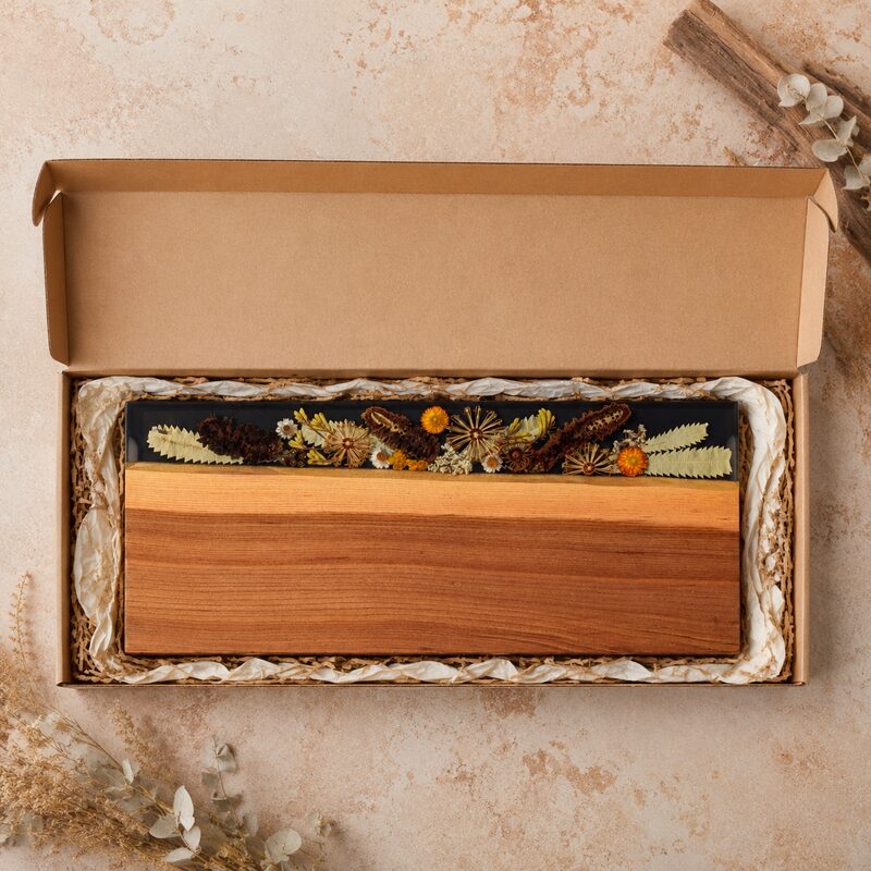 Large Australian botanical serving board presented securely inside a fitted natural kraft gift box.