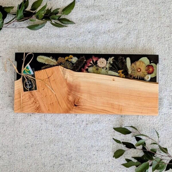 This Resin Board is a super special with its dried Florals. All of our serving boards are one of a kind and can never be replicated! This board makes a wonderful special occasion gift whether its newlyweds or a housewarming gift.