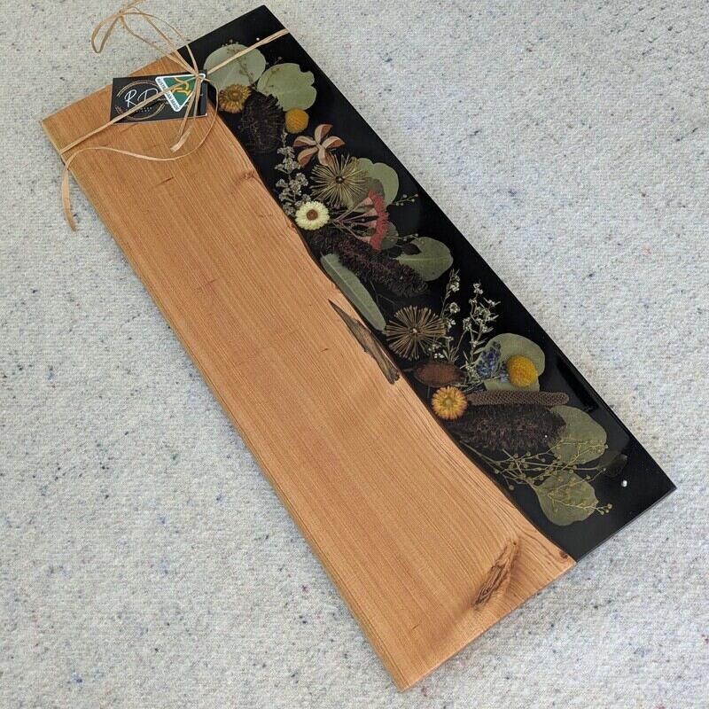 Introducing our exquisite range of handcrafted Cheese boards, uniquely designed with Australian native flora and sustainably sourced timber. These stunning pieces are more than just serving boards; they’re a celebration of Australia’s natural beauty and make the perfect gift for any occasion.