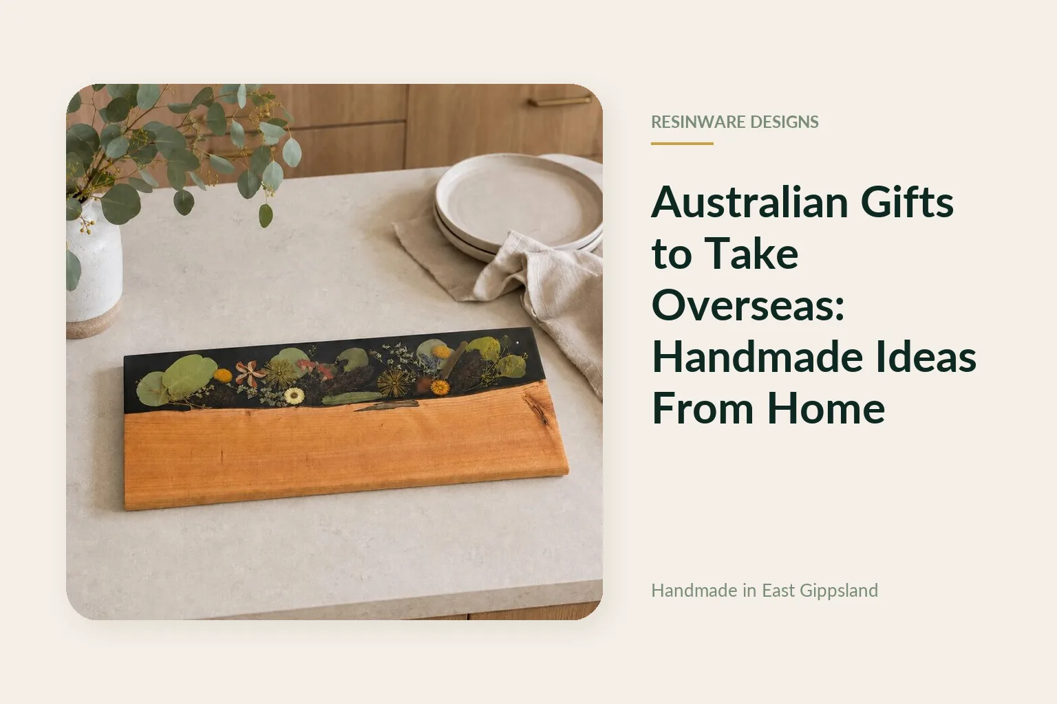 Handmade timber and resin board with native Australian flowers on a kitchen bench