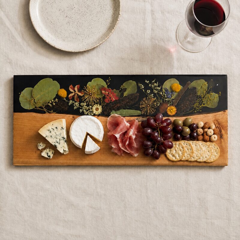 Australian timber and botanical resin grazing board styled with cheese, crackers, cured meat and fruit.