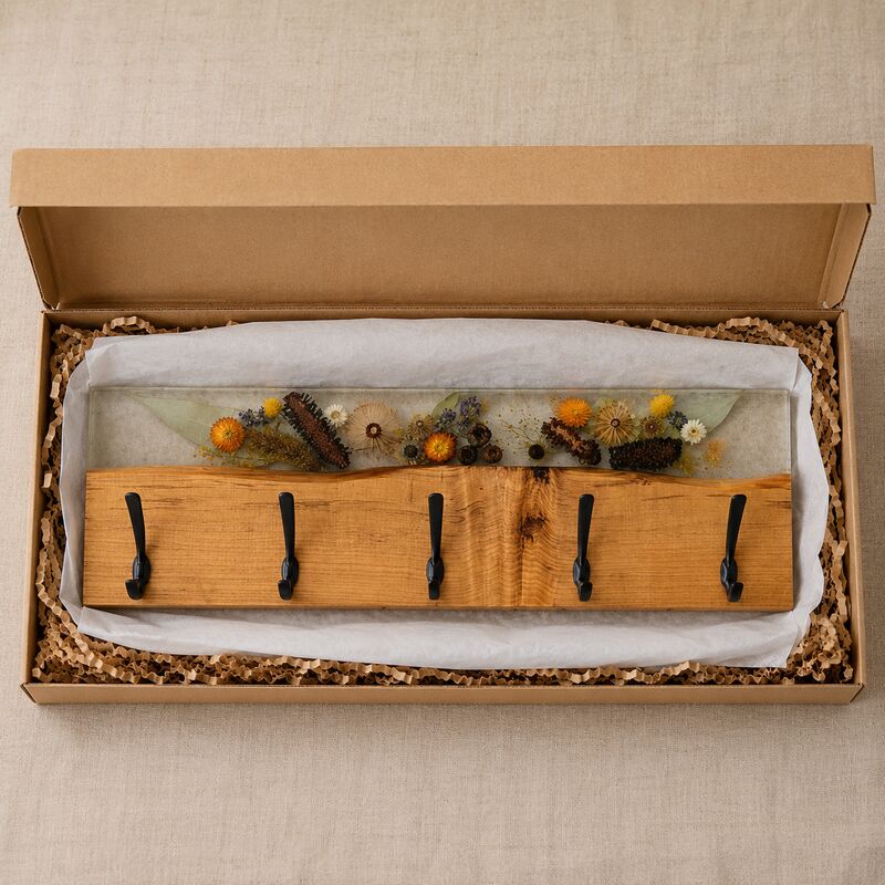 Australian timber and botanical resin coat rack presented in an open natural kraft gift box.